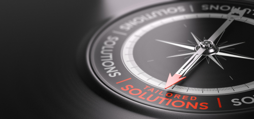 Compass pointing to tailored solutions text