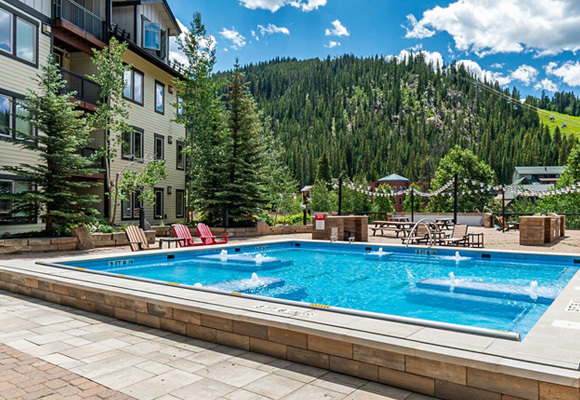 Poolside by the mountains in Winter Park.