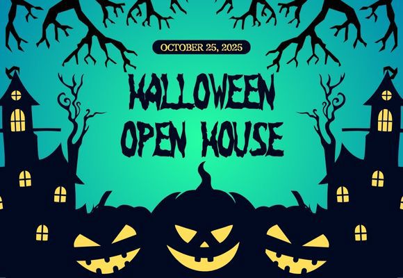 Halloween scene with lit pumpkins and houses