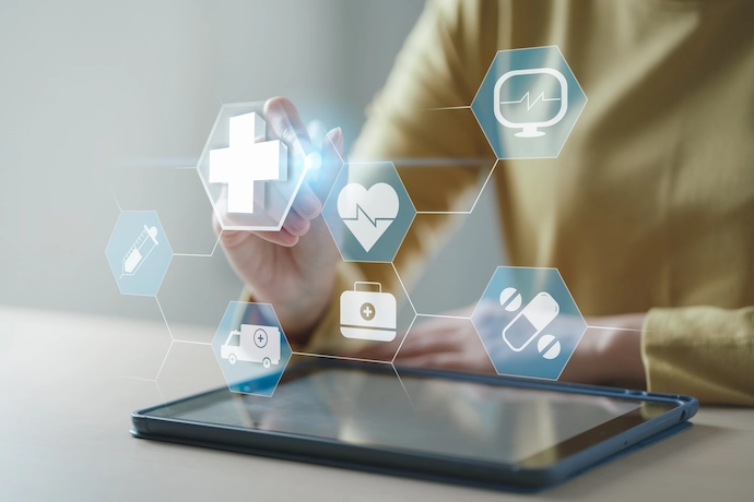 healthcare provider looking at analytics on a laptop